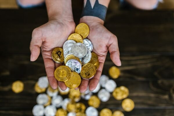 child holding gold coin
